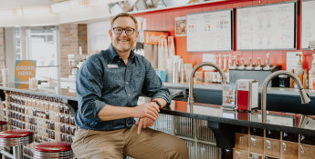 Tony Coast of Linger Gig Lab in Cimarron sits at the retro counter