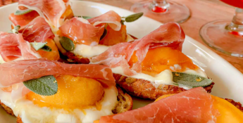 Honey Whipped Ricotta Crostini with Peaches and Prosciutto