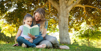 Child and mom reading book