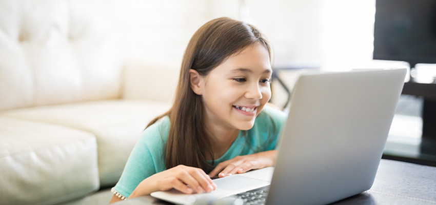 young girl learning at home