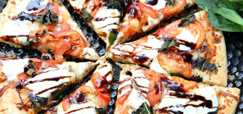 https://kansaslivingmagazine.com/sites/default/files/styles/header/public/caprese-pizza-5-post.jpg?itok=YwhotyAD