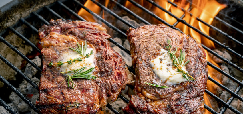 Grilling steaks in the summer