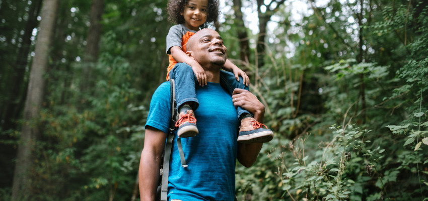 man walking with son