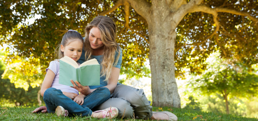 Child and mom reading book