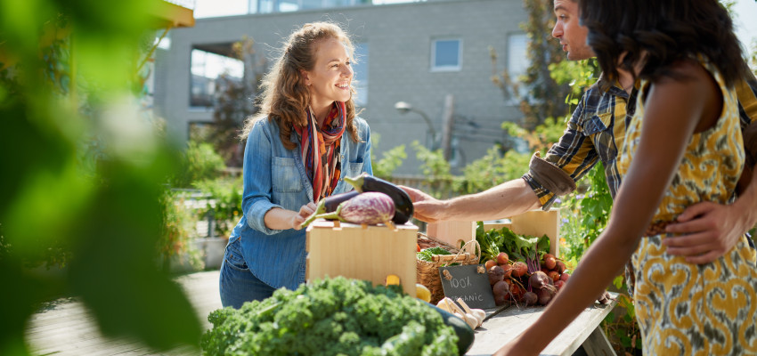 man and woman at farmers market