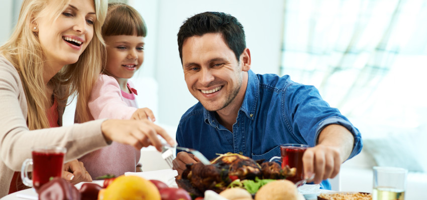 family eating turkey leftovers