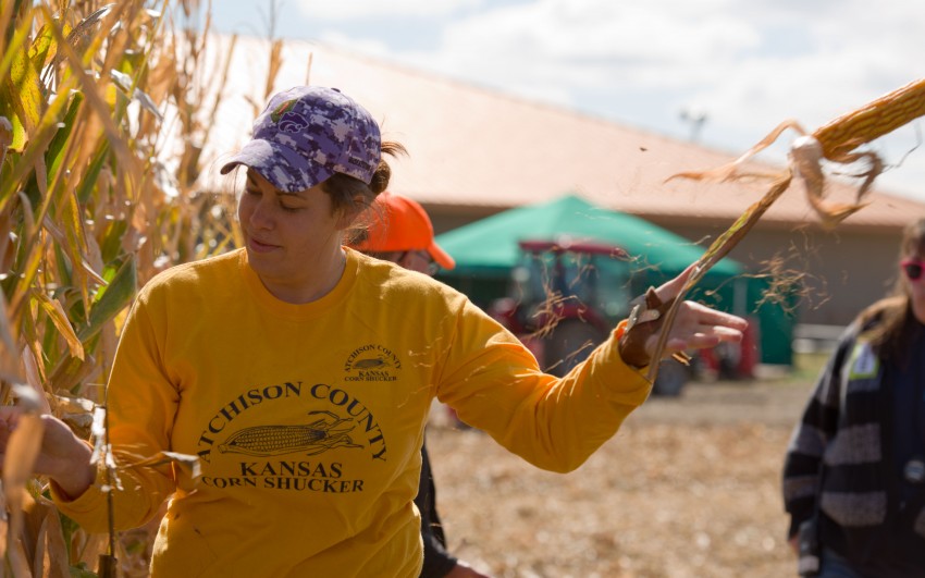 Cornhusking at the Oakley Corn Festival in Oakley, Kansas.