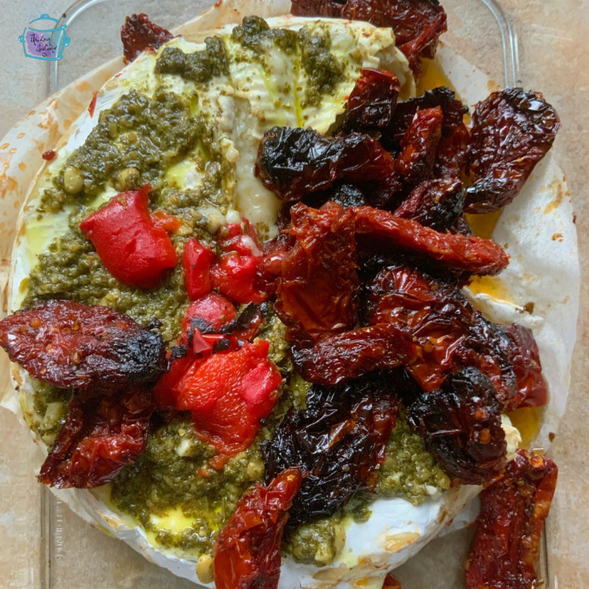 Slow Cooker Baked Brie with Pesto and Sun-Dried Tomatoes