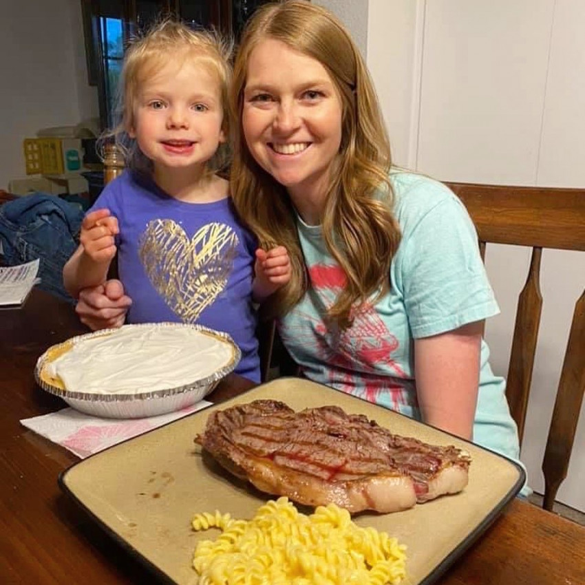Brandi Buzzard Frobose cooking with her daughter