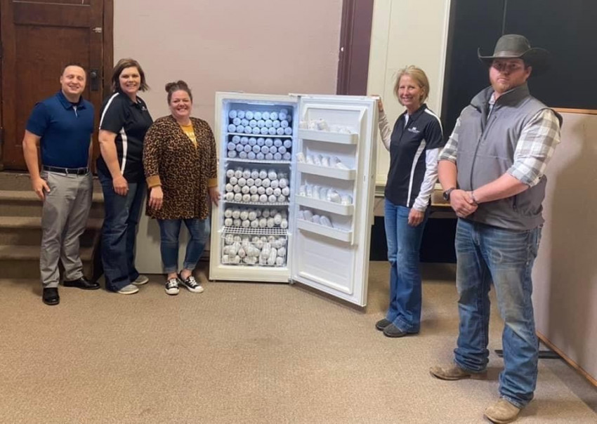 Left to right: Bryan Kracht, former Farm Bureau Financial Services Agent; April Todd, Pony Express Partnership for Children Director; Patti Dollarhide-Marshall County Farm Bureau Board Member; Alex Parker, Circle P Processing Owner