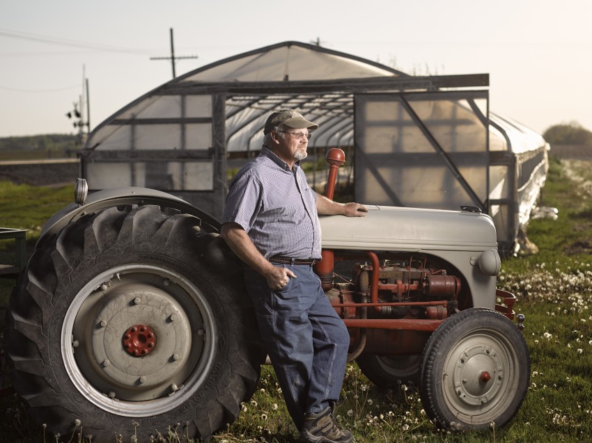 man and old tractor