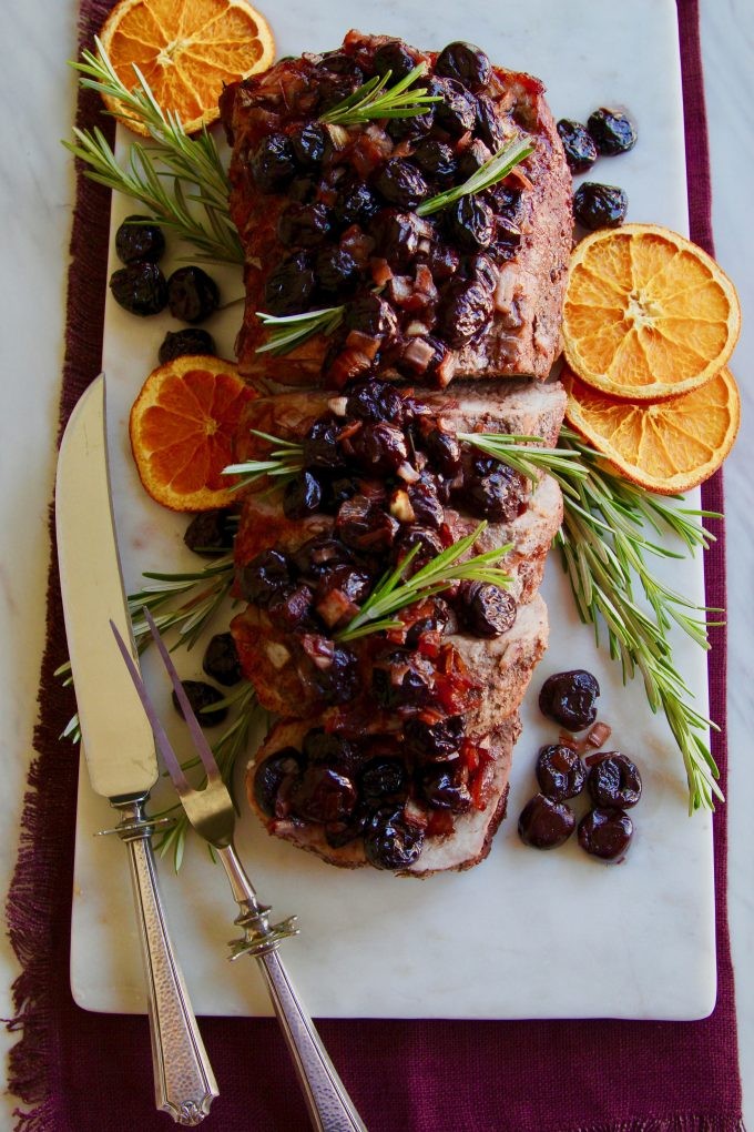 cherry-balsalmic-roasted-pork-loin-top-view-of-sliced-roast-with-dried-oranges