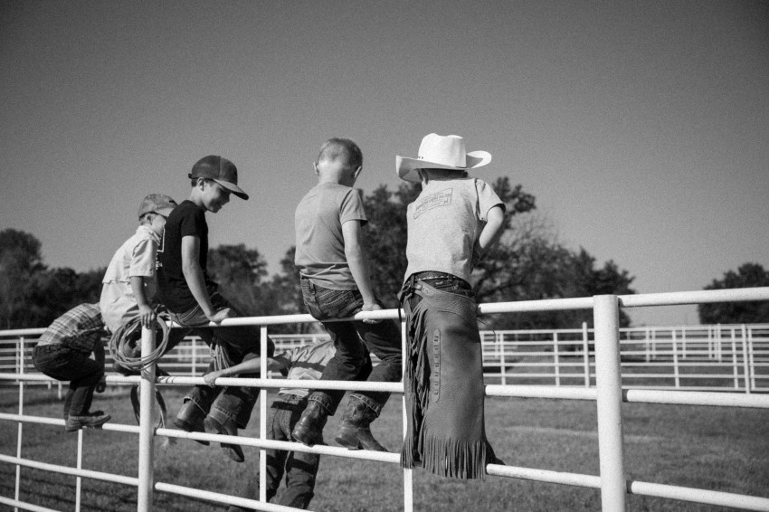 branding_cowboys on fence