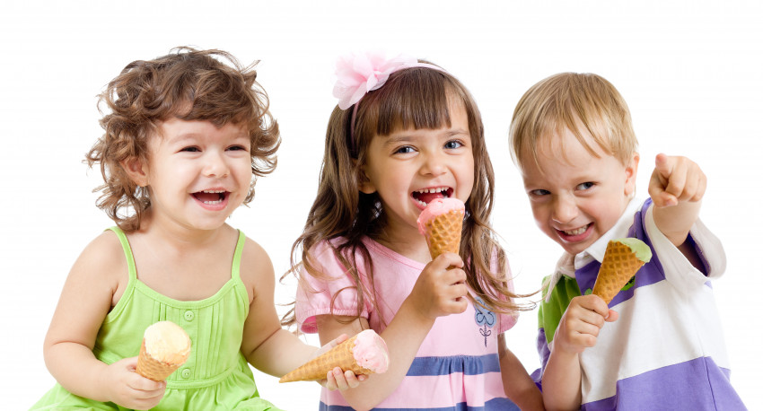 three kiddos eating ice cream