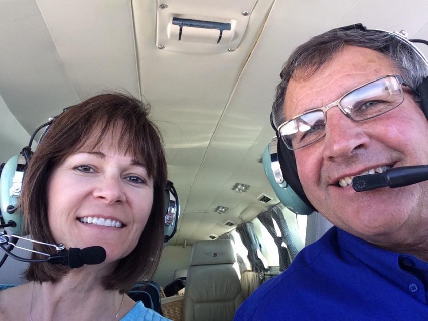 Ken and Colleen Bixenman in crop dusting plane