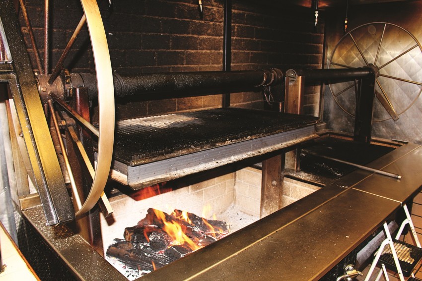 The Texas-built grill at Munson's Prime is fueled by locally grown oak.