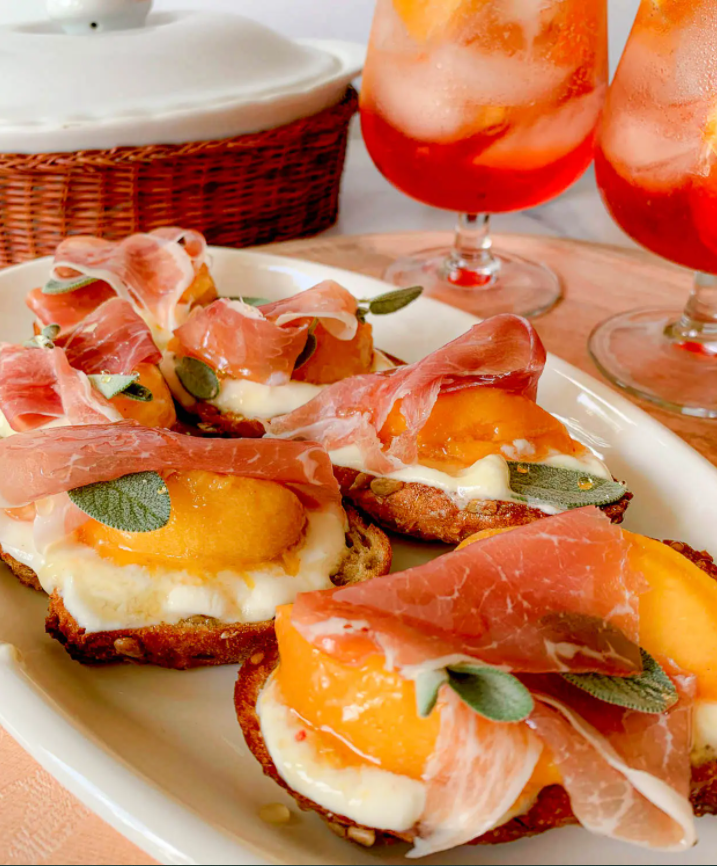 Honey Whipped Ricotta Crostini with Peaches and Prosciutto