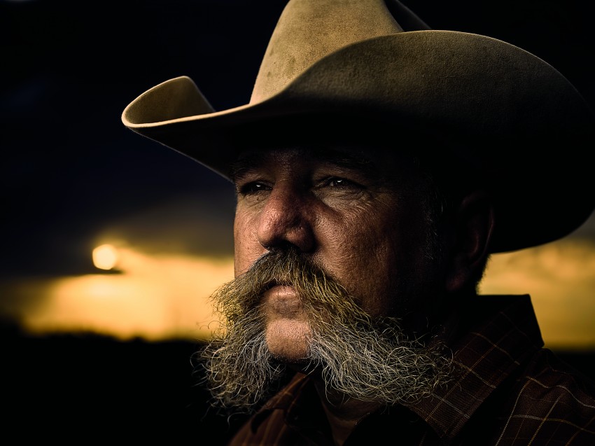 Capturing the grit of a farmer in the flash of a photo provides a story in and of itself. This snapshot of David Pieper, Rooks County rancher, shows the rough and tough tale of a Kansas cowboy.