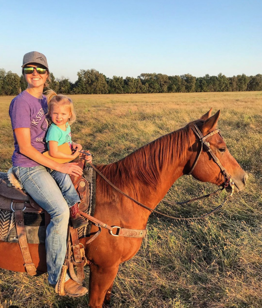 Brandi Buzzard Frobose with daughter on horse