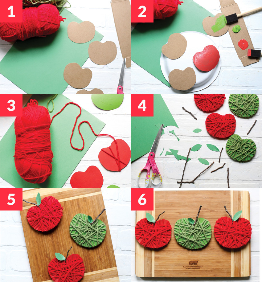 kids craft with apples and yarn